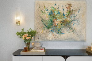 Console Table With Vase Of Flowers