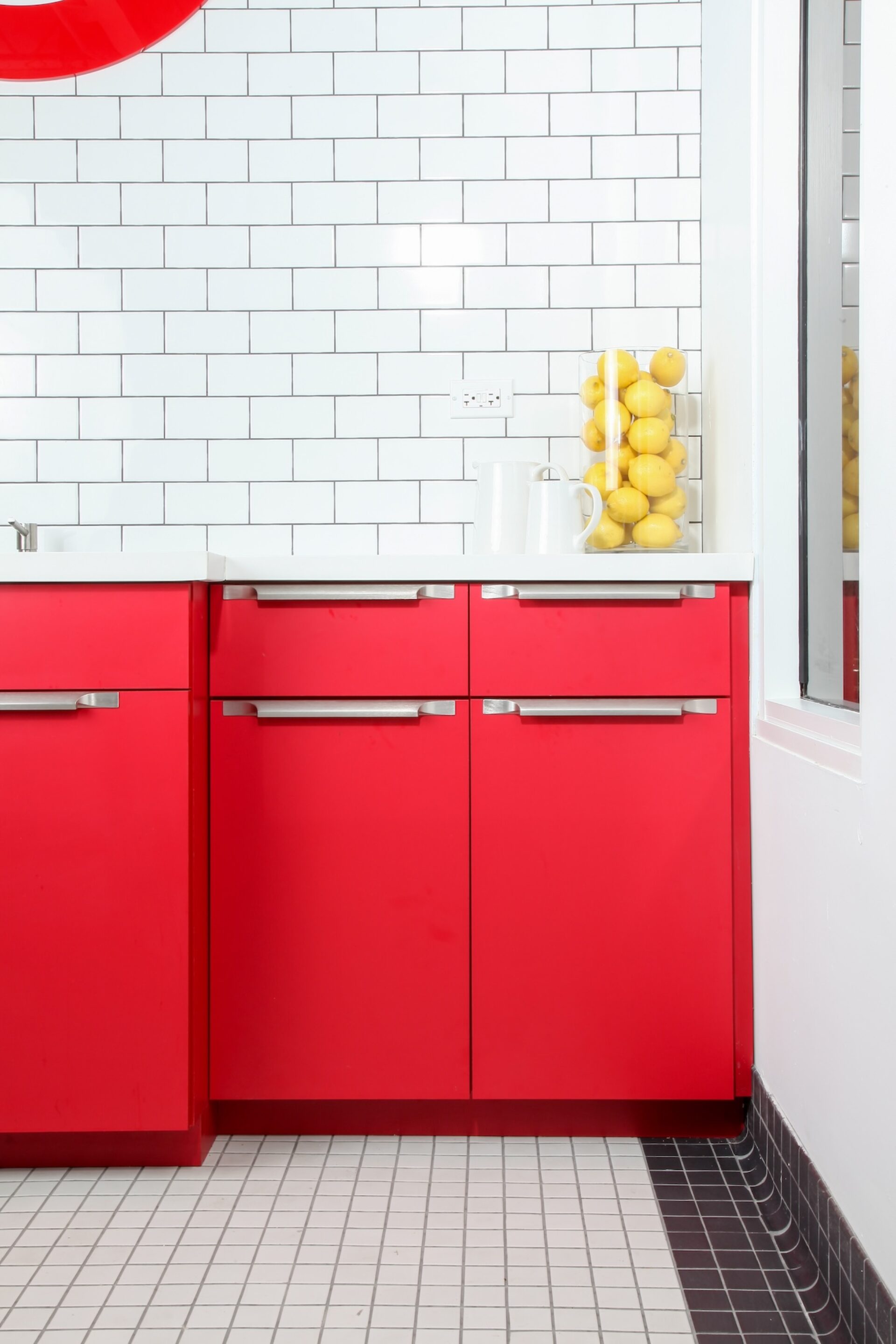 Red Cabinetry With Stainless Steel Hardware